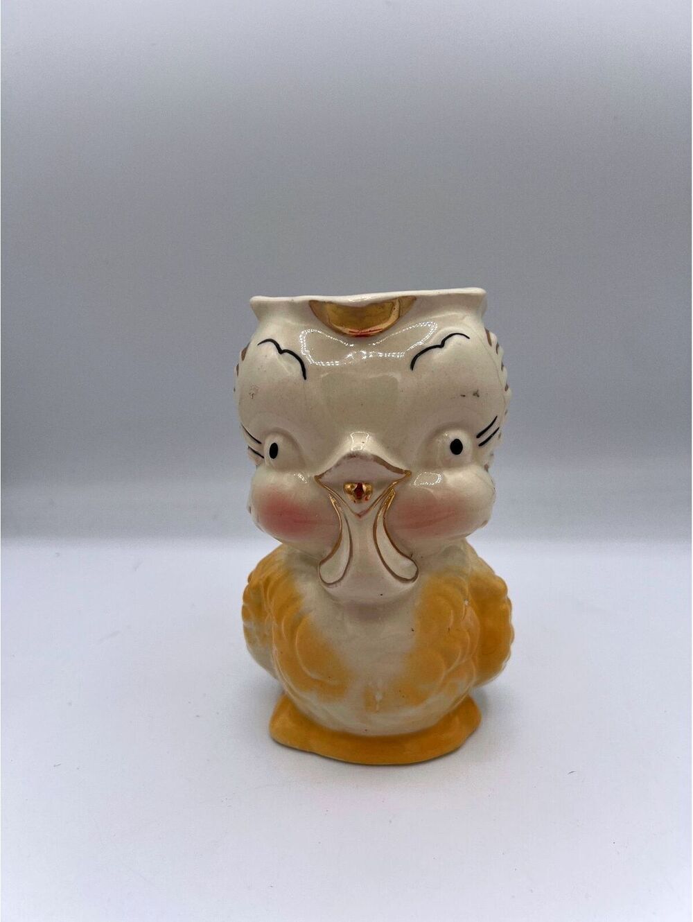 Vintage Shawnee Pottery Bird Pitcher with Gold Accents